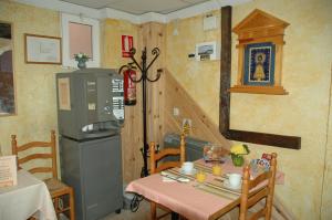 Kuchyň nebo kuchyňský kout v ubytování Hostal El Cartero