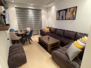 Posezení v ubytování APPARTEMENT KARIAT CABO