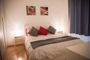 Posteľ alebo postele v izbe v ubytovaní Principe Apartment