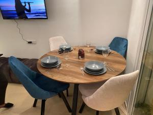 TV a/nebo společenská místnost v ubytování APPARTEMENT KARIAT CABO