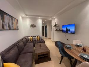 TV a/nebo společenská místnost v ubytování APPARTEMENT KARIAT CABO
