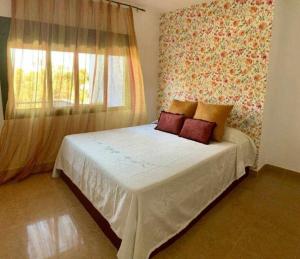 Posteľ alebo postele v izbe v ubytovaní Apartamento 2 en chalet con vista abierta al mar