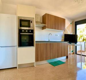 Kuchyňa alebo kuchynka v ubytovaní Apartamento 2 en chalet con vista abierta al mar