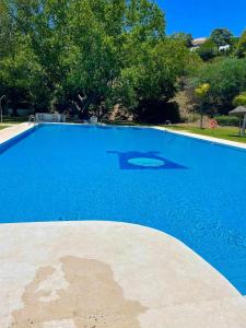 Bazén v ubytovaní Apartamento 2 en chalet con vista abierta al mar alebo v jeho blízkosti
