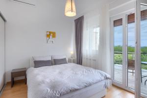 Posteľ alebo postele v izbe v ubytovaní Casa Lori