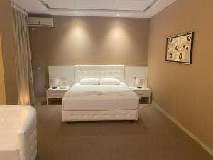 Postel nebo postele na pokoji v ubytování Hotel Continental