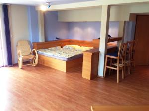 Postel nebo postele na pokoji v ubytování Beach Pension