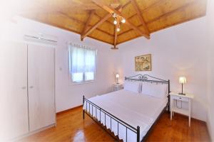 A bed or beds in a room at Katerina