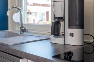 Kuchyň nebo kuchyňský kout v ubytování VILLAGE CLUB LES SABLONS