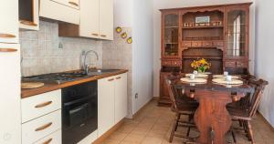 A kitchen or kitchenette at Domo Galante
