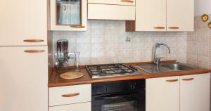 A kitchen or kitchenette at Domo Galante