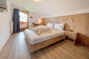 Rúm í herbergi á Residence Condor Apt Gitschberg