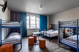 Postel nebo postele na pokoji v ubytování a&o Leipzig Hauptbahnhof + 32 fotografií