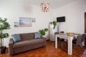 Posedenie v ubytovaní Appartamenti Villa Miramare