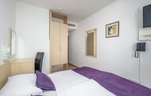 Postel nebo postele na pokoji v ubytování Hotel Slaven