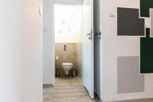 Kúpeľňa v ubytovaní Quadratum Apartment by Noclegi Renters