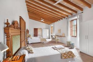 Postel nebo postele na pokoji v ubytování Villa Santanyí, Sueño de Verano