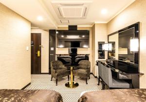 Uma área de estar em APA Hotel Hakataeki Chikushiguchi