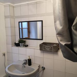 A bathroom at Gemütliche Wohnung in Wolfegg - Das Tor zum Allgäu