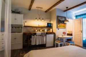 O bucătărie sau chicinetă la Apartmán Moment Banská Štiavnica