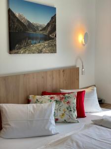 En eller flere senge i et værelse på Dachsteinblick
