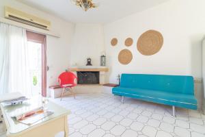Posedenie v ubytovaní Marilyn Boutique Apartment near Sandy Beach