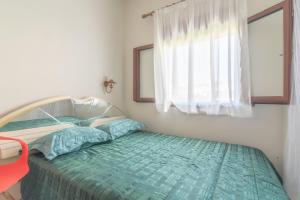 Posteľ alebo postele v izbe v ubytovaní Marilyn Boutique Apartment near Sandy Beach