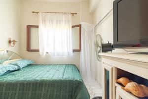 Posteľ alebo postele v izbe v ubytovaní Marilyn Boutique Apartment near Sandy Beach