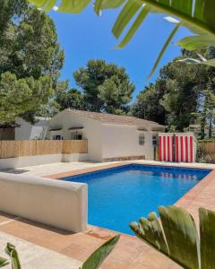 a swimming pool in the backyard of a villa at Quinta la Sal in Jávea