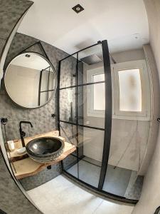 a circular bathroom with a sink and a mirror at Smp BLING BLING in Toulon