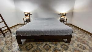 Säng eller sängar i ett rum på Arte Povera Landhaus in idyllischem Naturreservat