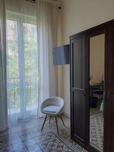 Televízia a/alebo spoločenská miestnosť v ubytovaní "RUNFULÌA" Deluxe apartment