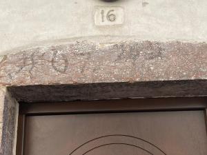 a building with the number above a door at ON the RAIL by Arcotrilogy-Homes in Arco