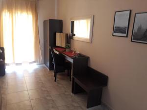 TV a/nebo společenská místnost v ubytování Hotel Epavli
