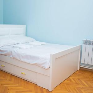 מיטה או מיטות בחדר ב-Spitak Tun