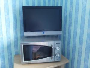 A television and/or entertainment centre at Haus Hilde