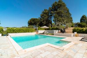 The swimming pool at or close to HelloApulia - Trulli Le Murge
