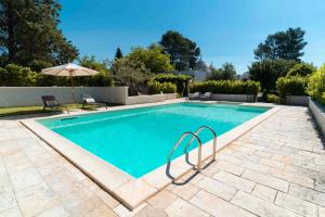The swimming pool at or close to HelloApulia - Trulli Le Murge
