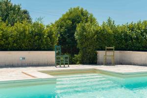 The swimming pool at or close to HelloApulia - Trulli Le Murge