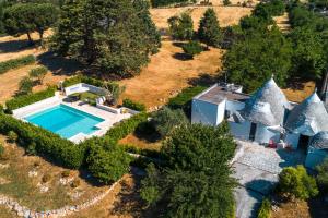 The swimming pool at or close to HelloApulia - Trulli Le Murge