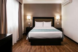 Voodi või voodid majutusasutuse Wyndham Costa del Sol Piura toas