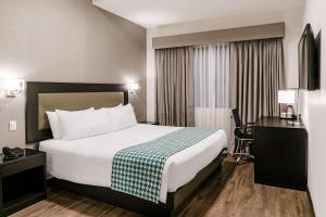 Voodi või voodid majutusasutuse Wyndham Costa del Sol Piura toas