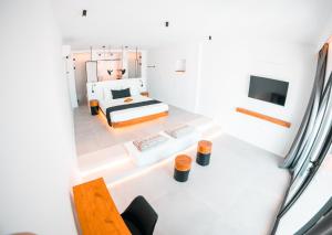 Μια τηλεόραση ή/και κέντρο ψυχαγωγίας στο Villa Agrabely & Suites