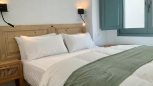 Posteľ alebo postele v izbe v ubytovaní El Gavell, Terrace Boutique Apartament