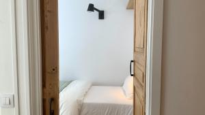 Posteľ alebo postele v izbe v ubytovaní El Gavell, Terrace Boutique Apartament