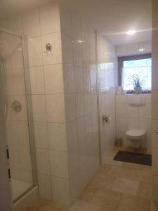 Koupelna v ubytování Appartement Catrin mit Sauna und E-Ladestation