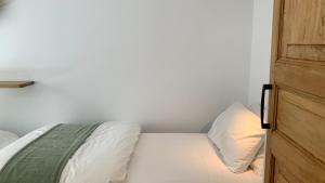 Posteľ alebo postele v izbe v ubytovaní El Gavell, Terrace Boutique Apartament