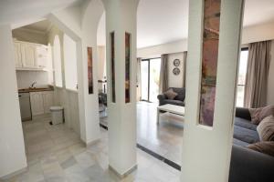 Kuchyňa alebo kuchynka v ubytovaní Urb. Alhambra II 15