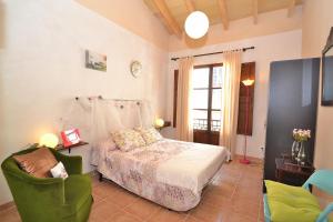 Voodi või voodid majutusasutuse Casa Es Forn 229 by Mallorca Charme toas