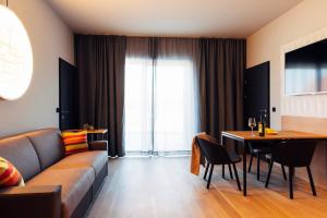 Televiisor ja/või meelelahutuskeskus majutusasutuses harry's home Steyr hotel & apartments